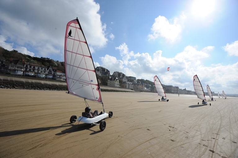 La plage de long en large